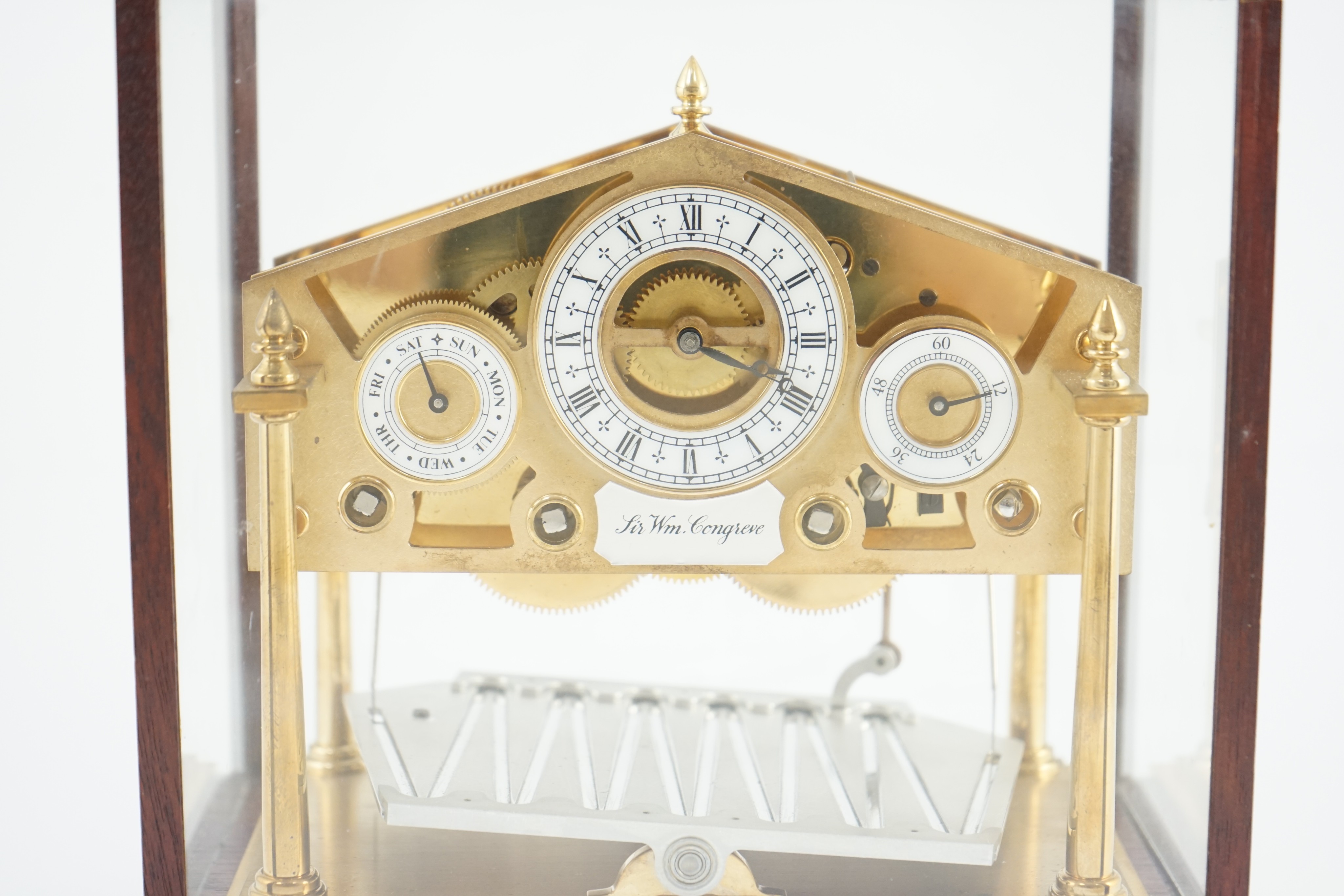 A Devon Clocks lacquered and silvered brass Congreve timepiece, 23cm wide, 15cm deep, 22cm high